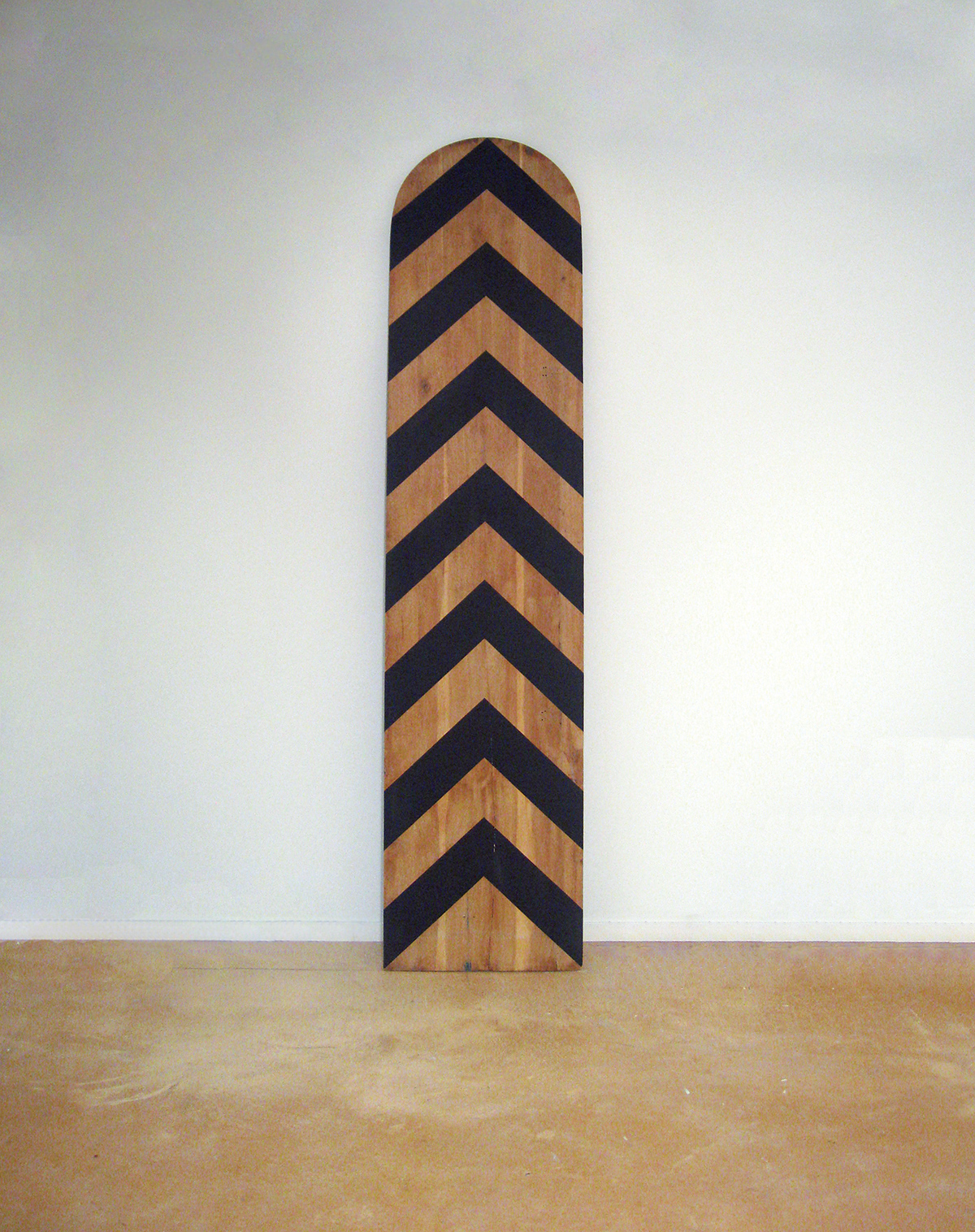 Jonathan Naas black arrows painted on oak wood.